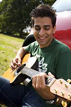 Playing guitar