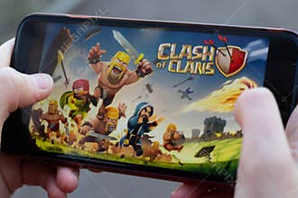 New York, USA - 1 May 2020: Clash of Clans game mobile app logo close-up on phone screen, Illustrative Editorial