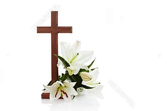 Cross with lilies isolated on white background for decorative design. Spring background. Easter card.