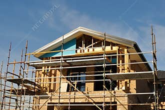 House front in scaffolds