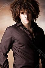 Handsome man with curly hair