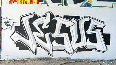 Mural featuring Jesus name in graffiti style in the Fabrication Yard in Dallas, Texas.