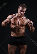 Muscle wet nude young bodybuilder