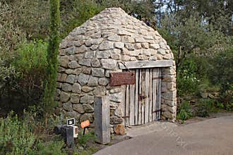 A replica of a Borrie or ox stable in a biome in the Eden Project in Cornwall, England