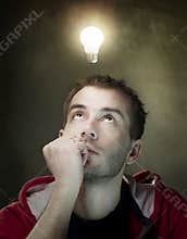 Idea bulb above mans head