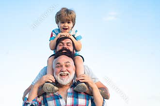 Fathers day. Father and son with grandfather - Men generation.