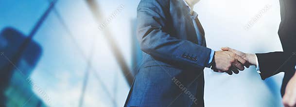 Businessmen handshake - business meeting and partnership concept