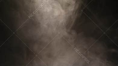 Atmospheric smoke Fog effect. VFX Element. Haze background. Abstract smoke cloud. Smoke in slow motion on black background. White