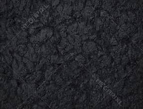 Natural black stone texture for backgrounds. Top view