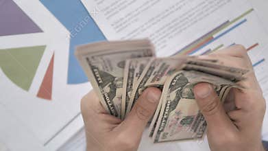 Top View of Hands Counting Dollar, Cash