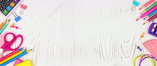 School supplies double side border banner on a white wood background with copy space. Back to school.