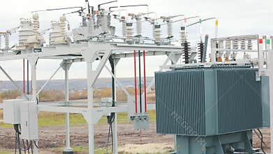 Solar Station Equipment. A transformer at a power plant, a transformer at a solar power station.