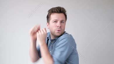 Caucasian man dancing celebrating his success or birthday.