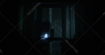 Thief is Looking inside the House Through the Windows with Flashlight Opening the Back Door and Entering the Property at Night Sho