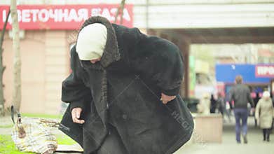 Beggar homeless woman. Poverty. Vagrancy. Kyiv. Ukraine.