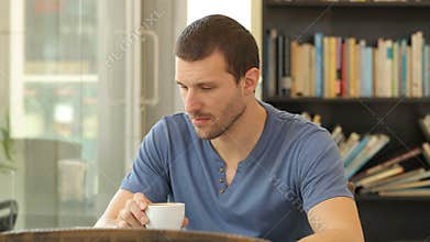 Sad man complaining in a coffee shop