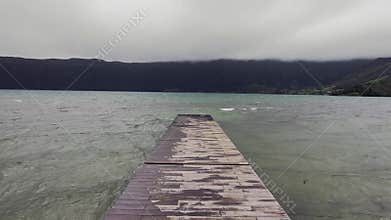 Walk on the pier towards the sea
