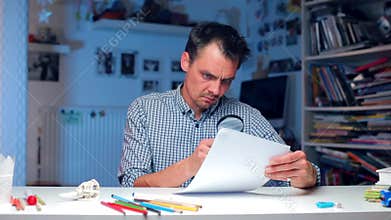 Policeman is studying crime documents