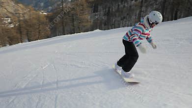 Snowboarder follow shot