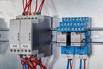 Two phase change control relays and two intermediate relays in the electrical Cabinet