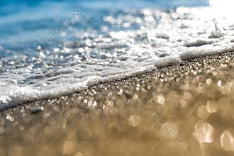 Sand beach and sea foam macro