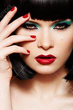 Fashion model. Christmas glitter make-up, manicure