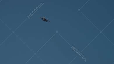 Fighter jet performing aerobatics