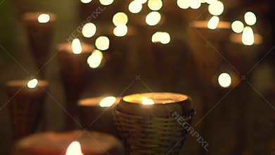Candles flame in religion ceremony at temple