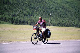 Tourist travel on a bicycle across Altai