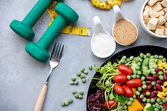 Diet Healthy food and lifestyle health concept. Sport exercise equipment