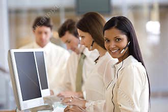 Call center with smiling woman