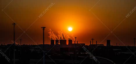 Coal fired power station adding to pollution before sunset