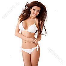 Vivacious young woman in a white bikini