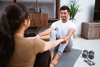 Asian fitness couple, man and woman exercising together at home