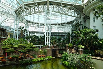 Beautiful river and tropical plants inside of Gaylord Opryland Resort and Convention Center near Nashville, Tennessee, U.S