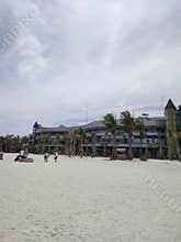 Sand beach with shining sun with family
