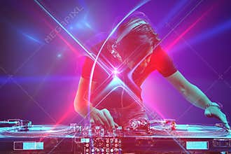 Dj plays music with a mixer at the discotheque party