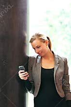 Stylish woman reading text messages