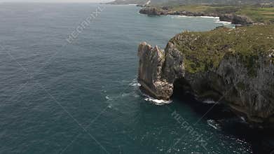 Panoramic view from the top of a cliff and the blue sea in Ribadeseia
