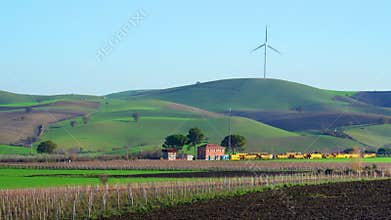Alternative Energy Wind Turbine in Beautiful Green Landscape video 4k