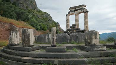 Tholos with Doric columns at the Athena Pronoia temple ruins in Delphi, Greece