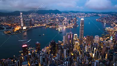 Cityscape view of Hong Kong island, drone aerial day to night hyperlapse time lapse. Skyscraper buildings in financial district