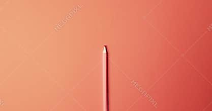 Overhead view of red crayon with copy space on red background, in slow motion