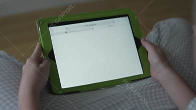 The child learns artificial intelligence on a tablet. Close-up of a GPT chat open on a tablet.