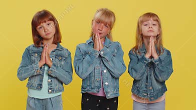 Three girls siblings friends praying, making wish, begging apology, forgiveness, help