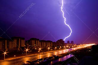 Lightning above night city