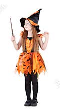 Little girl in orange costume of witch for Halloween