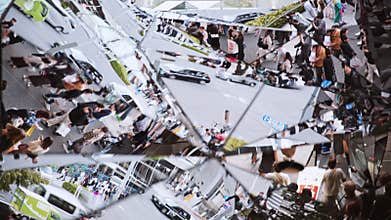 Crowd of Asian people walk on shopping street, car traffic transportation on road in Harajuku, fractured mirror view