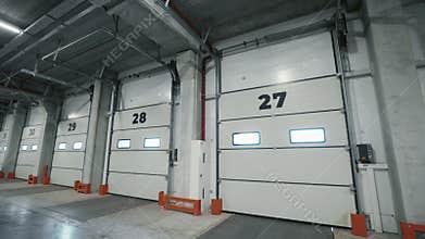 Factory Roller Door. Entrance to an Unoccupied Warehouse.