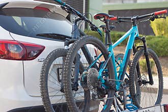 A car with a bicycle trunk